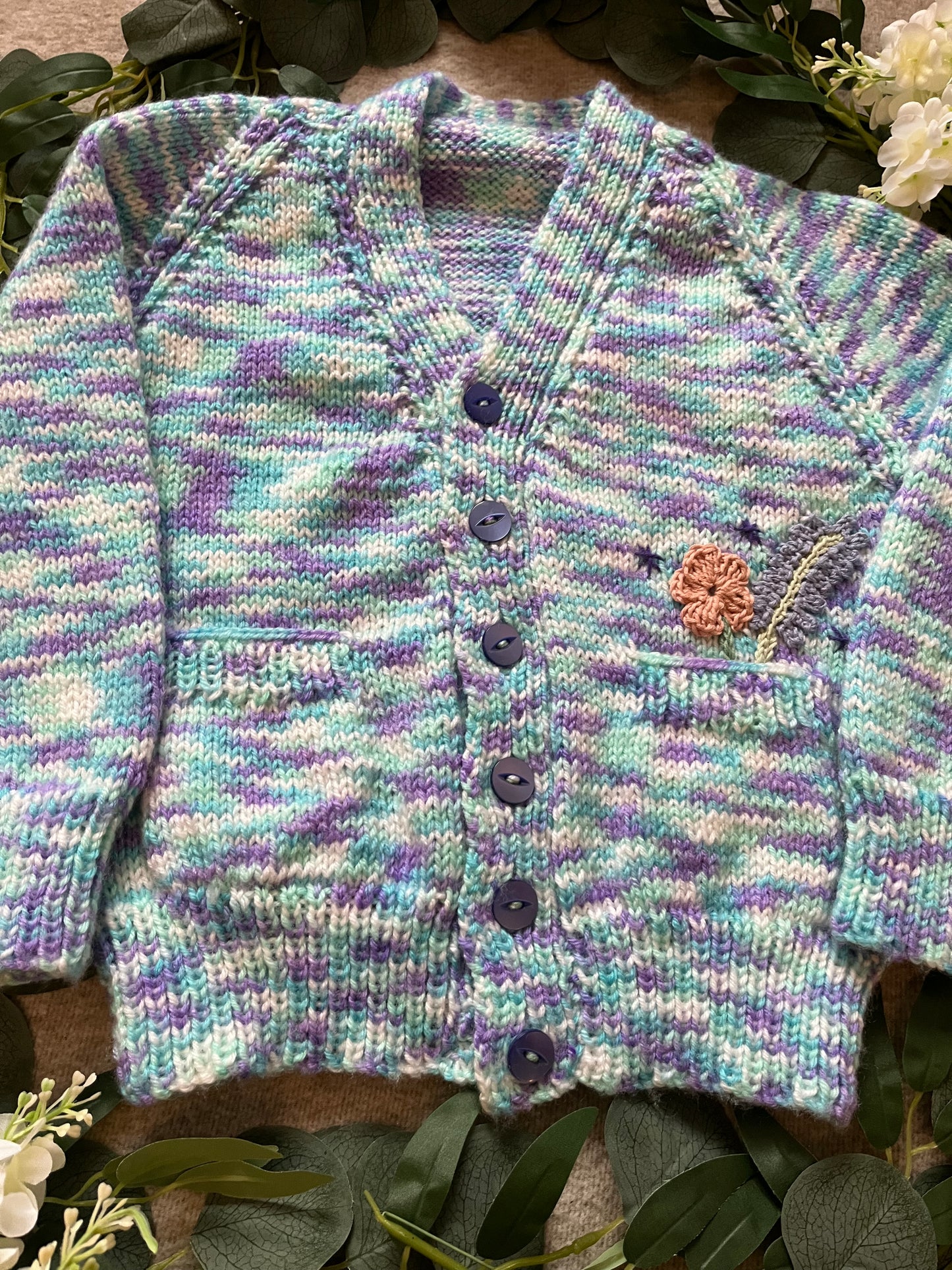 Size 3-5 Years, Grow Wild, Hand knitted Cardigan, Purple/ Blue/ White Fleck, Pocket Flowers