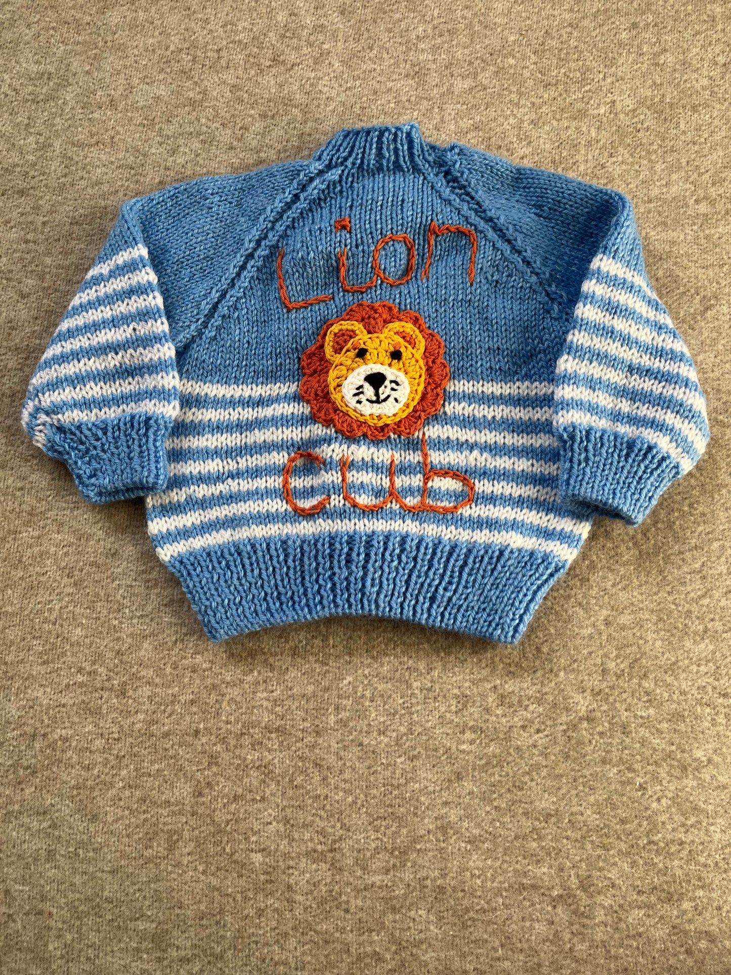 Size 6 Months, Lion Cub, Blue Hand Knitted Cardigan, White Stripe