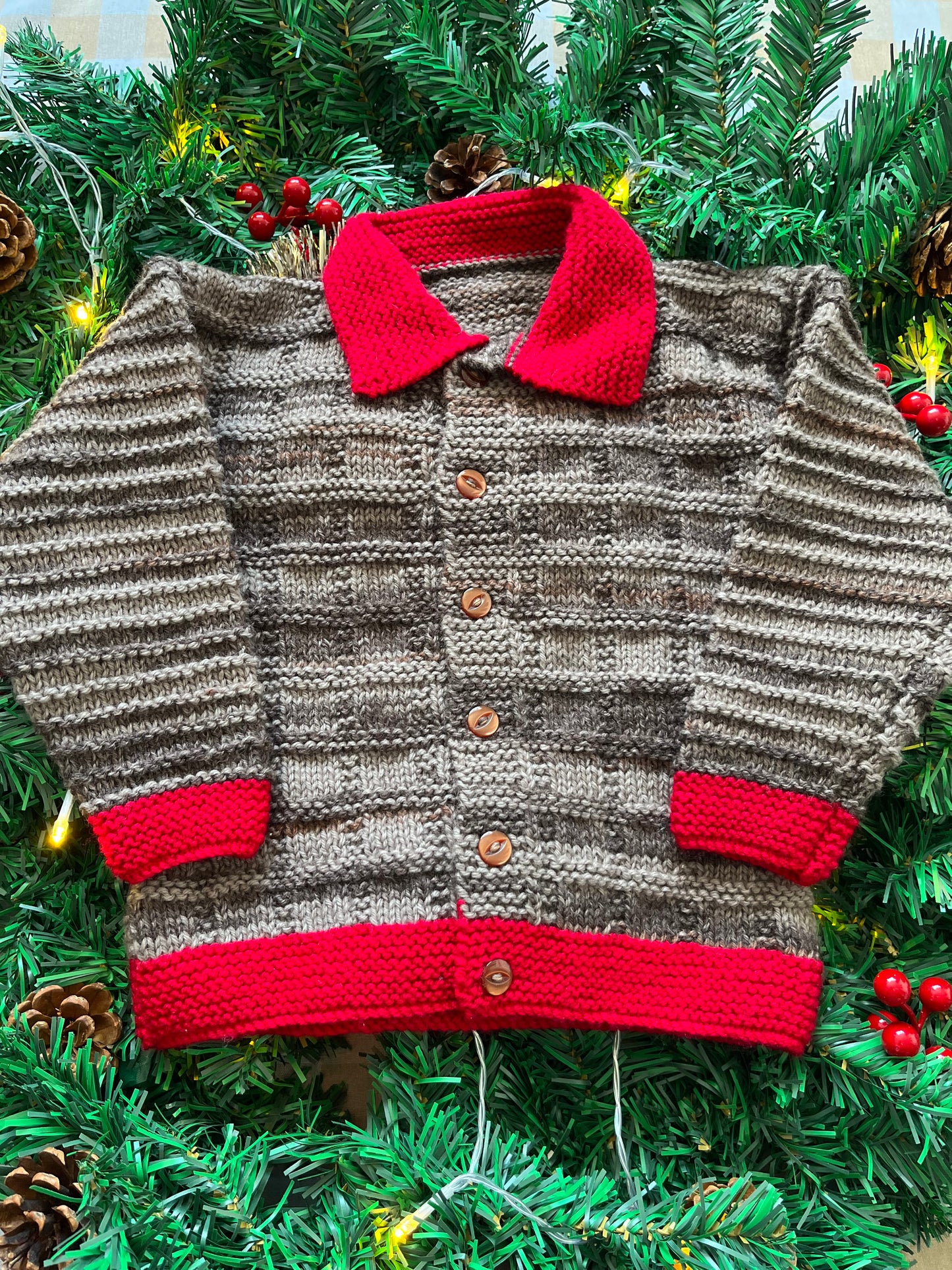 Size 2-3 years, Christmas Cow Cardi, Brown with a red trim.