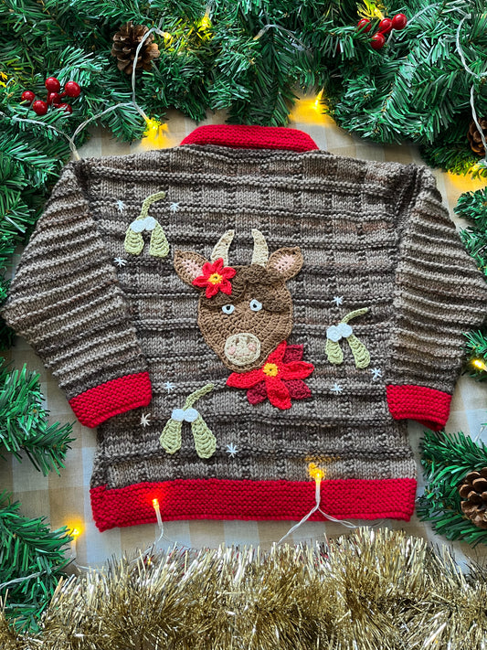 Size 2-3 years, Christmas Cow Cardi, Brown with a red trim.