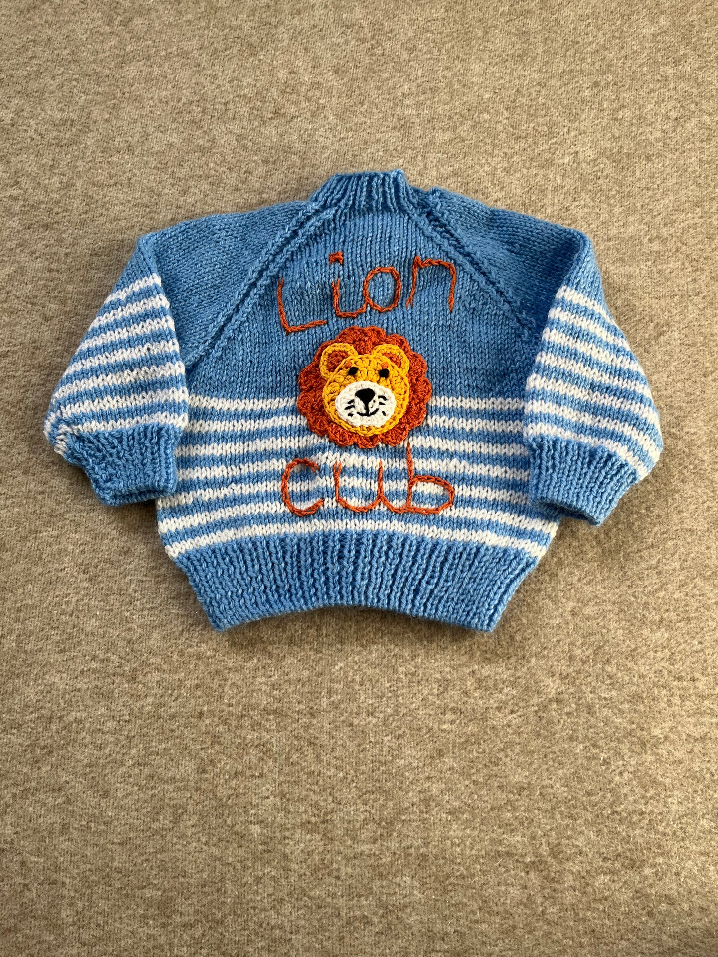 Size 6 Months, Lion Cub, Blue Hand Knitted Cardigan, White Stripe