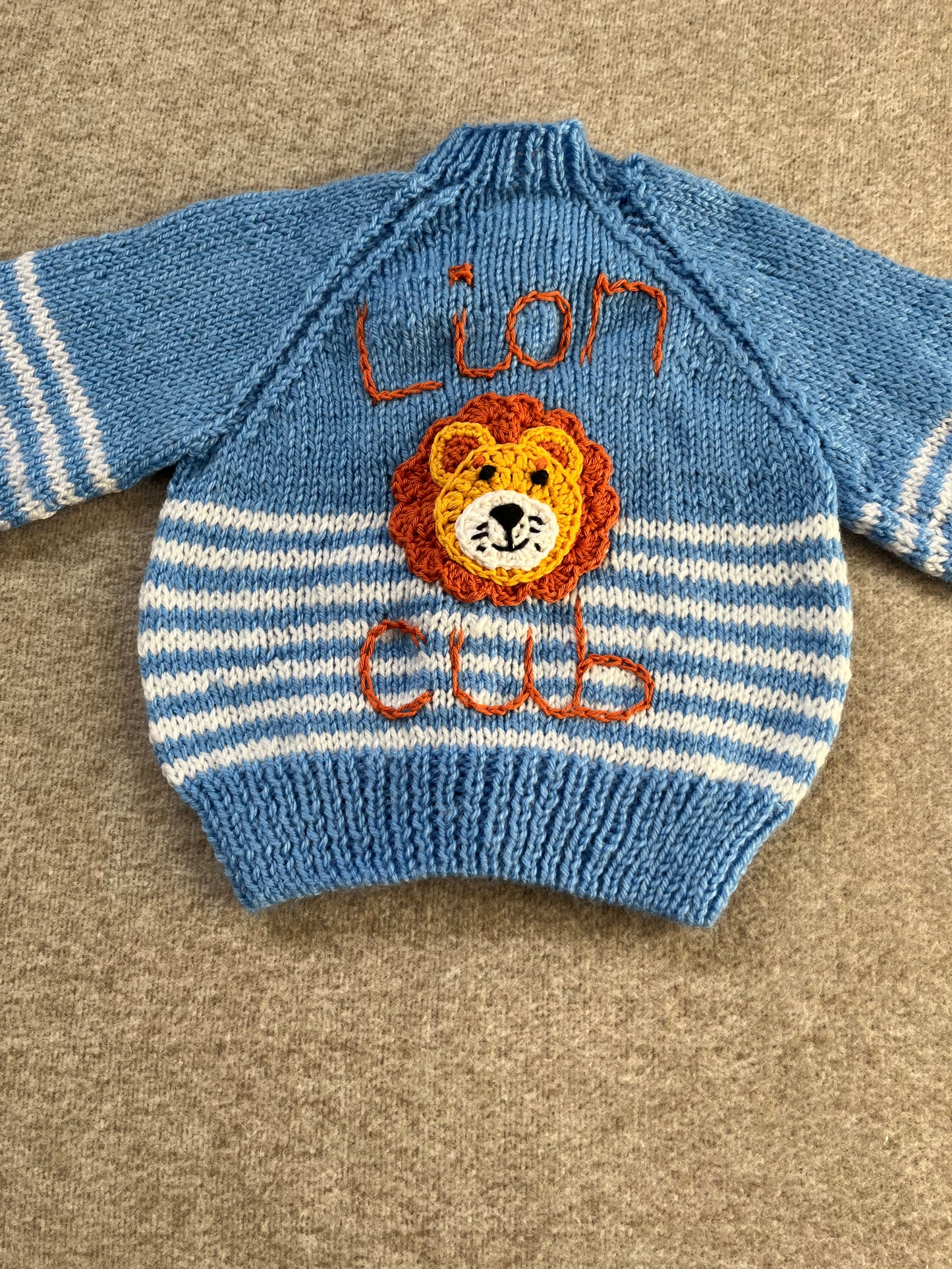 Size 6 Months, Lion Cub, Blue Hand Knitted Cardigan, White Stripe