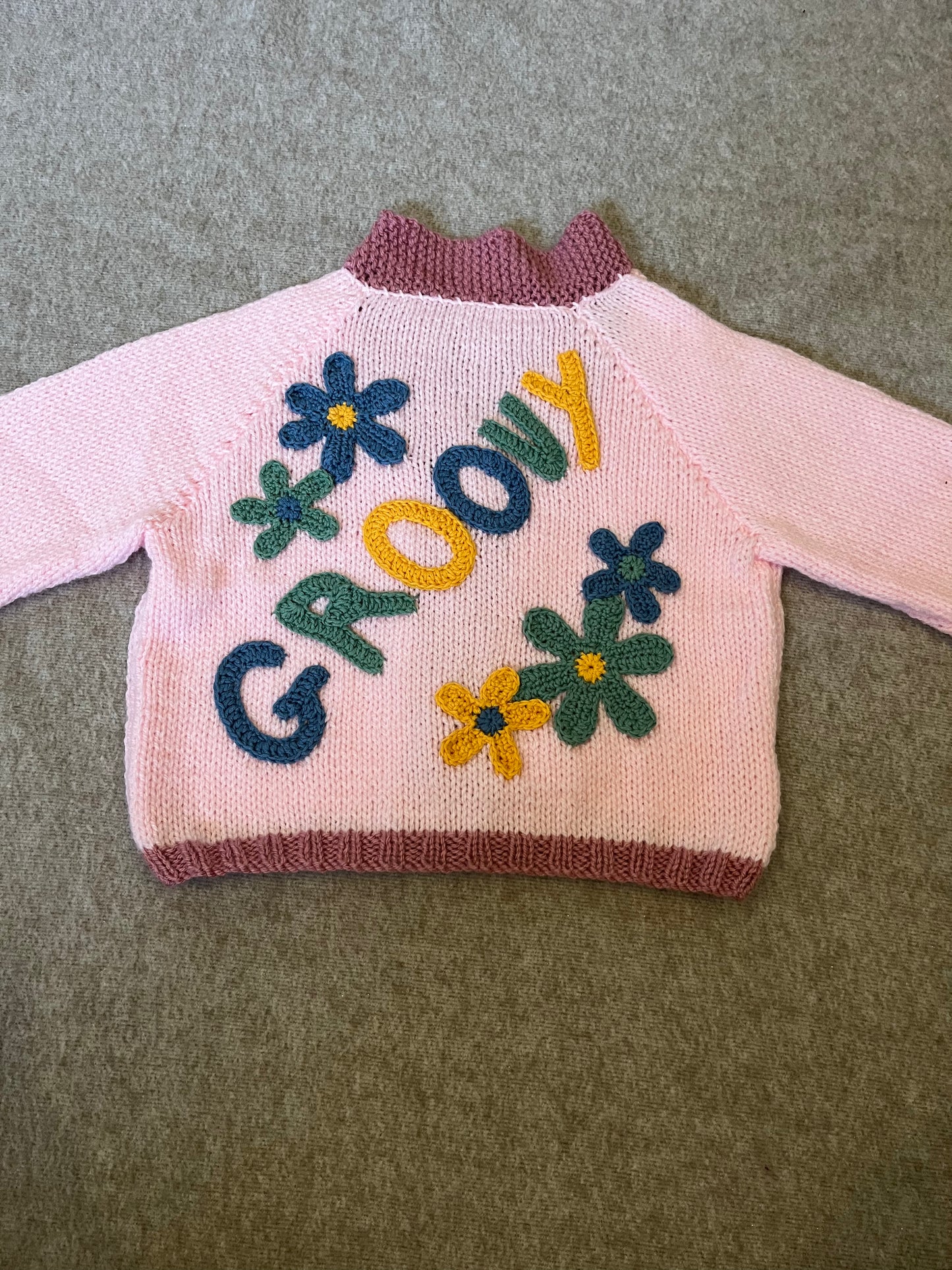 Size 2-3 Years, Groovy, Light Pink with a dusky pink boarder, Hand knitted, Retro Cardigan