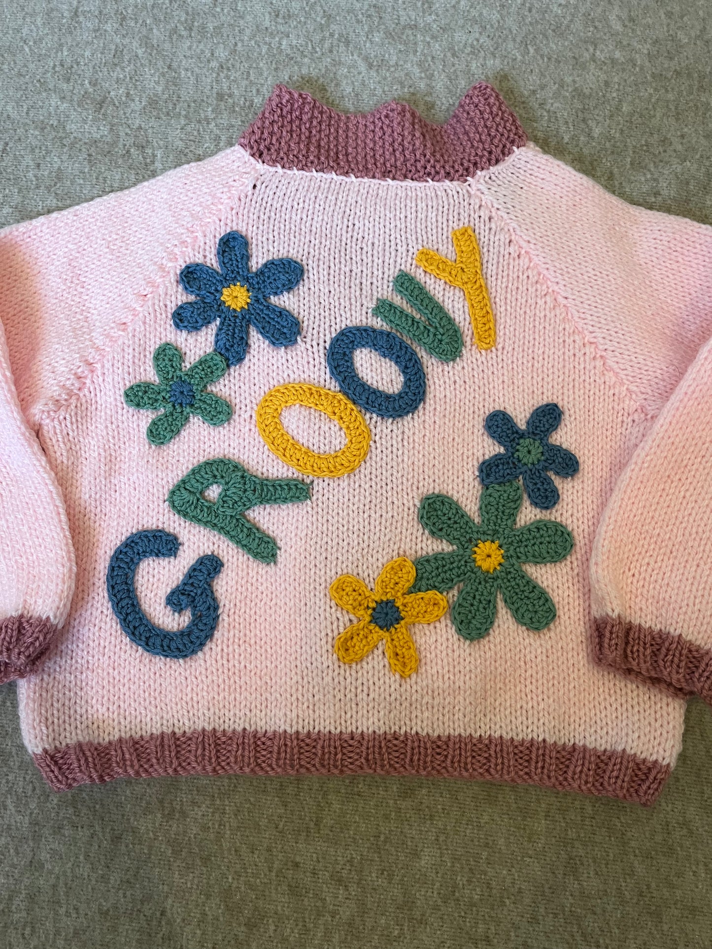 Size 2-3 Years, Groovy, Light Pink with a dusky pink boarder, Hand knitted, Retro Cardigan